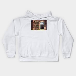 Window with climbing roses, administration building, Nordwolle industrial monument, Delmenhorst, Lower Saxony, Germany, Europe Kids Hoodie